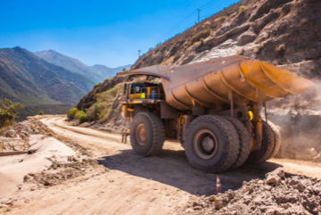Autonomous mining machinery in an open pit